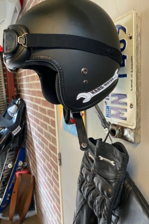 Handmade Helmet Hanger – A wrench on a board keeps your helmet safely stored